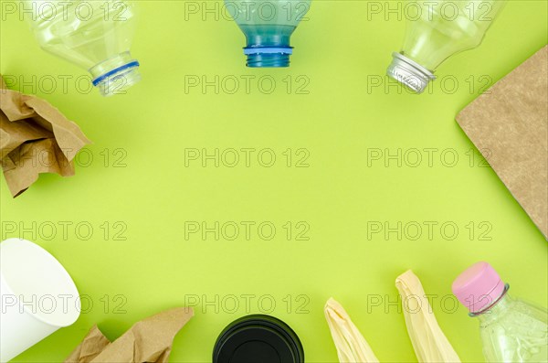 Top view colorful tableware green background