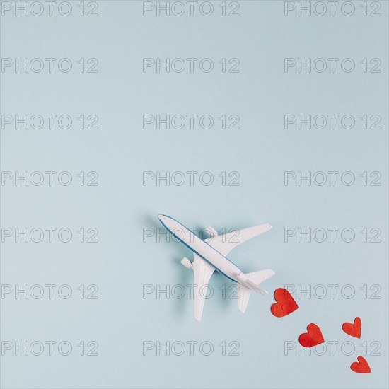 Toy plane model with read hearts