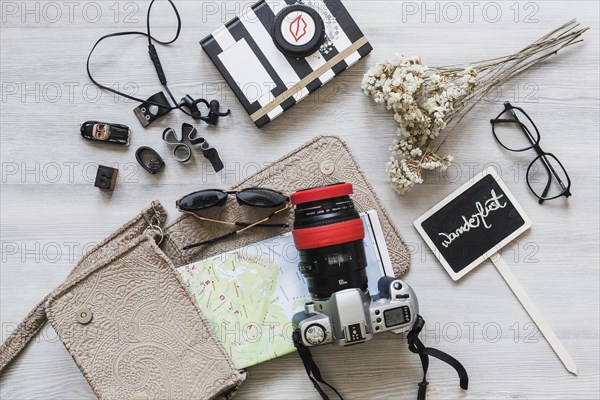 Travelling equipments wanderlust placard wooden desk