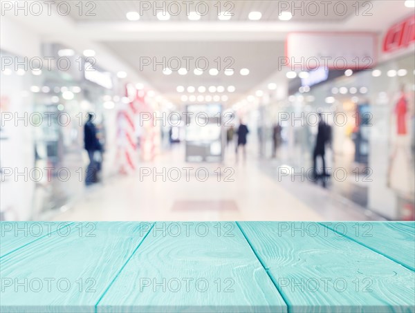 Turquoise wooden table front shopping mall