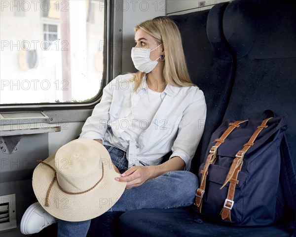 Woman with mask train