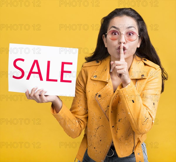 Woman yellow jacket silent gesture sales