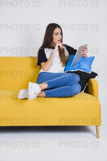 Young girl watching interesting information