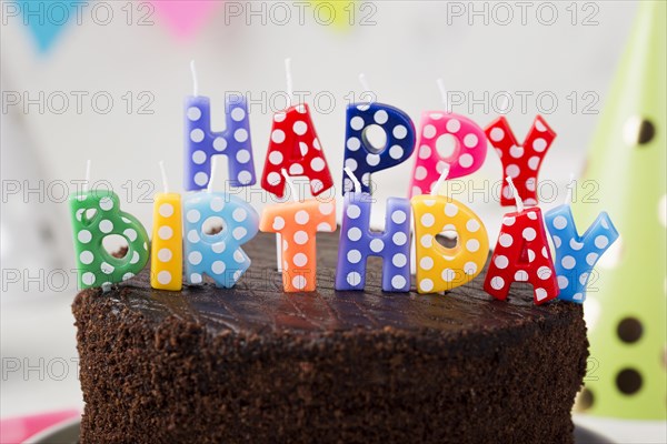 Assortment with birthday chocolate cake candles