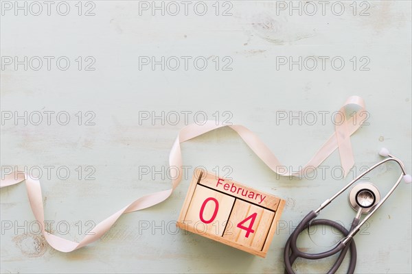 Awareness pink ribbon with stethoscope 4th february wooden box