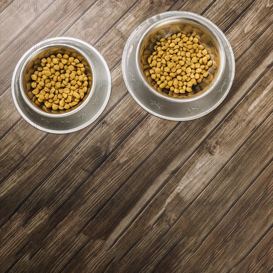 Bowls with pet food floor