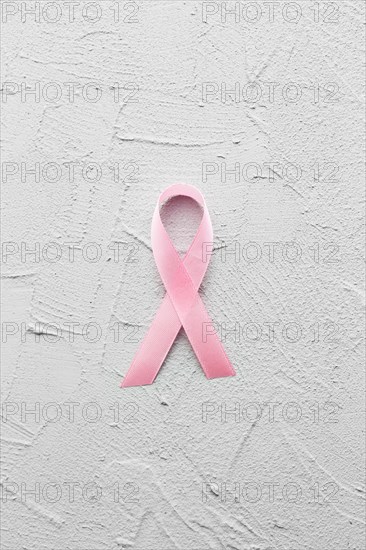 Breast cancer ribbon plaster background