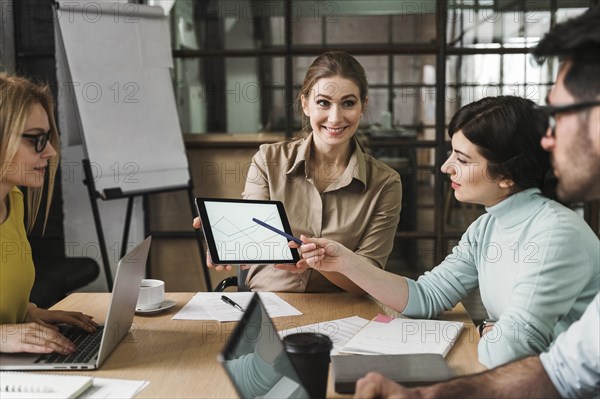 Businesspeople having meeting indoors