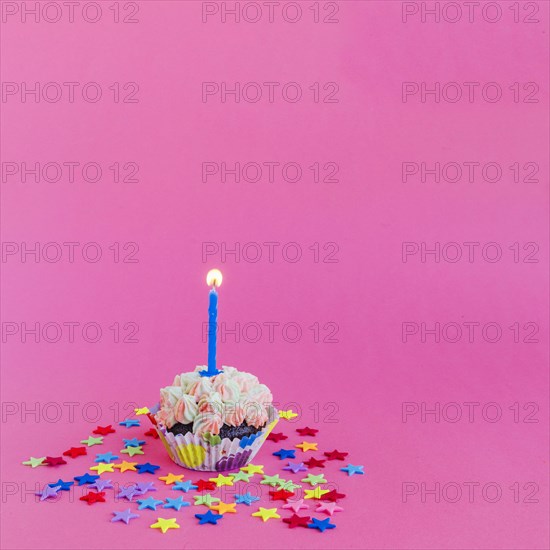 Candle burning cupcake