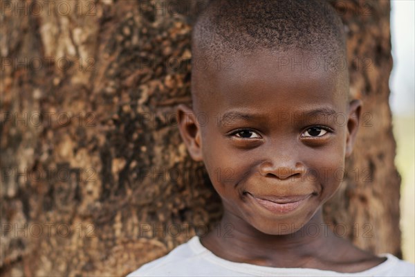 Close up smiley african kid outdoors