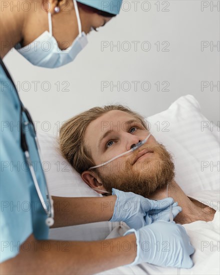 Close up woman checking patient