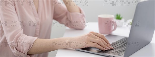 Close up woman desk working