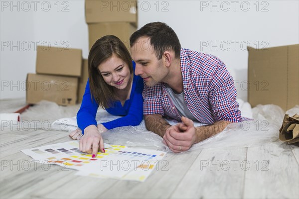 Couple choosing color interior decoration