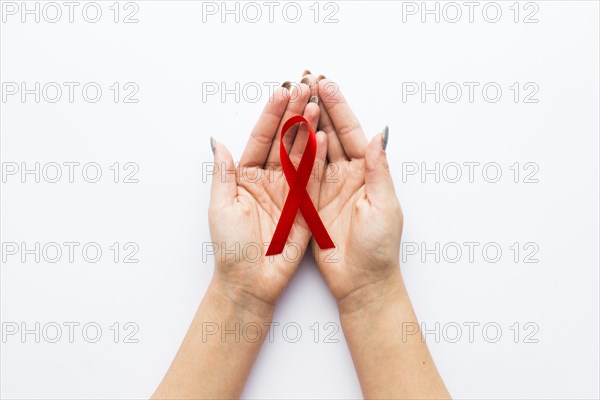 Crop hands with myeloma symbol