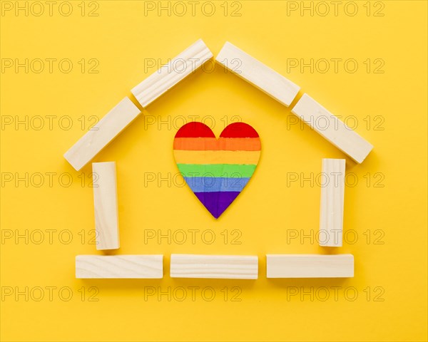 Cute lgbt family concept arrangement yellow background