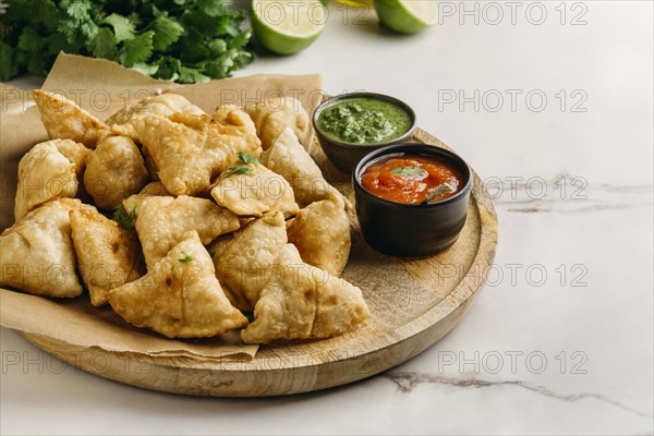 Delicious pakistani food with tomato sauce