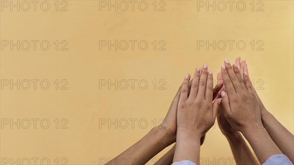 Different ethnicities high fiving