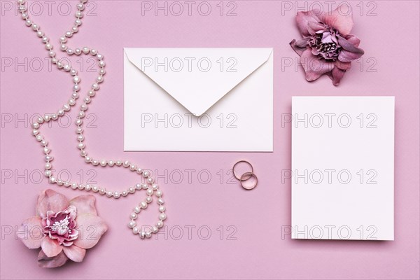 Elegant wedding invitation with pearls table