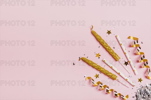 Flat lay copy space frame with candles glitter pink background