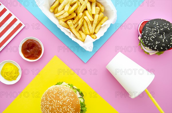 Flat lay hamburgers with fries