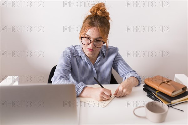 Front view female teacher home during online class