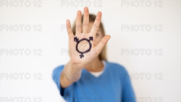 Front view hand with transgender sign