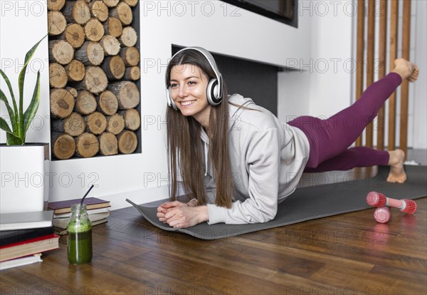 Full shot woman exercising