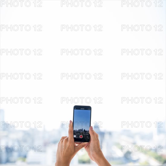 Girl taking picture landscape