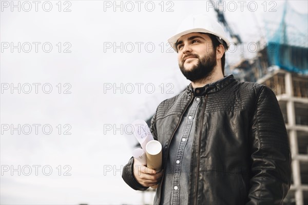 Handsome draftsman construction site