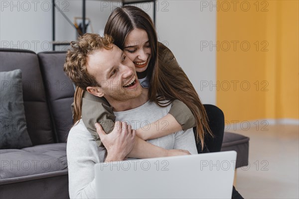 Happy loving woman man making plans renovate house together