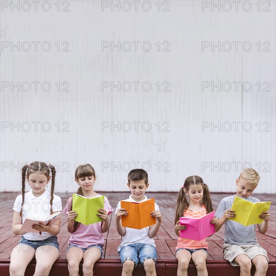 Kids reading books with copy space