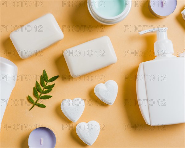 Liquid soap dispenser pump soap cream colored backdrop