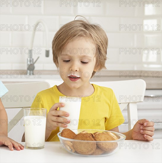 Little boy drinking milk