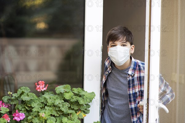 Little boy going outside after quarantine