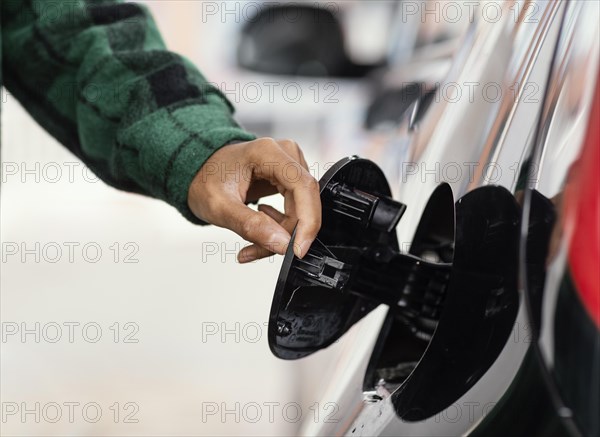 Man gas station with car