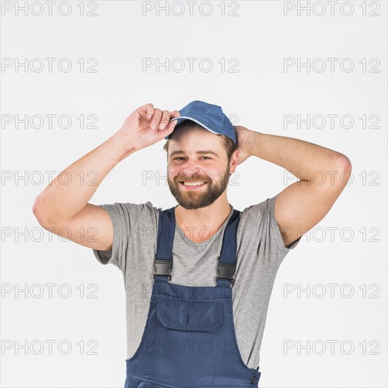 Man overall putting cap head