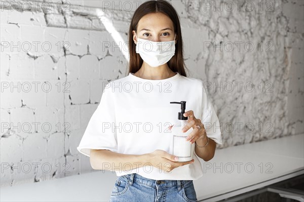 New normal office with face mask sanitizer