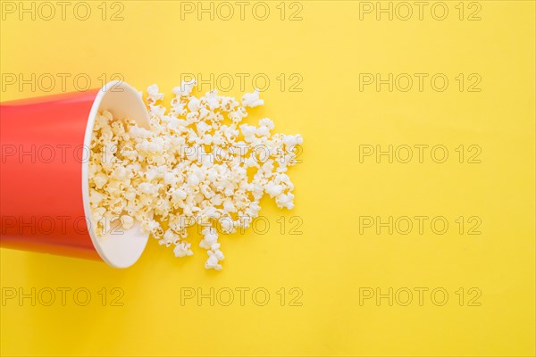 Popcorn bucket yellow background