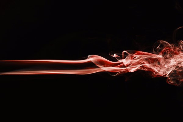 Red wavy smoke black background