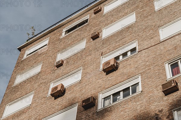 Residential building city with air conditioning units