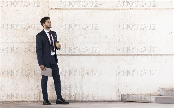 Side view lawyer with tablet coffee