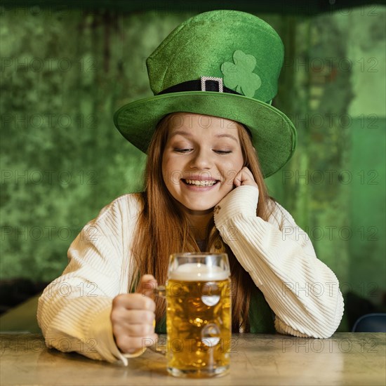 Smiley woman celebrating st patrick s day bar