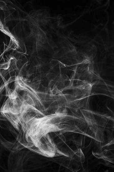 Tinted smoke textured fog black background