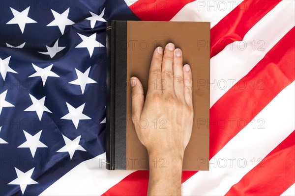 Top view hand book american flag