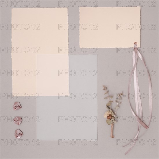 Top view wedding arrangement with invitations ornaments