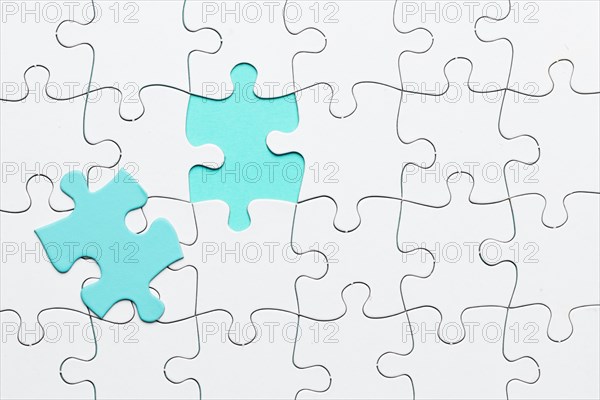 Turquoise piece puzzle white jigsaw puzzle backdrop