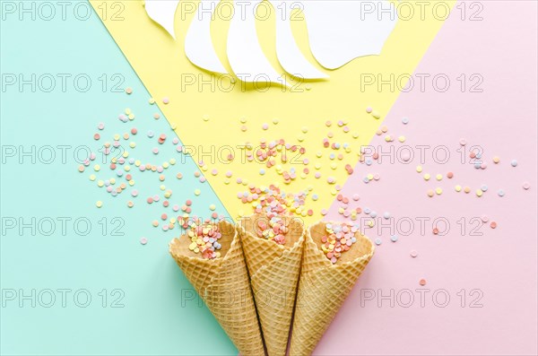 Waffle cones with sugar sprinkles palm leaf