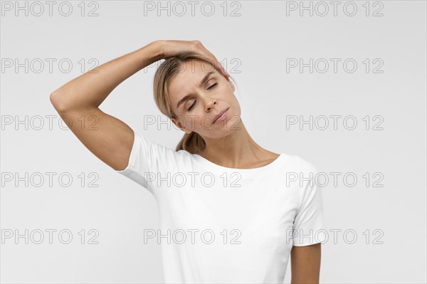 Woman doing physiotherapy exercises neck