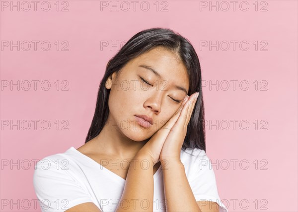 Woman holding her hands sleep