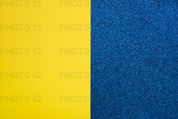 Yellow cardboard paper blue carpet